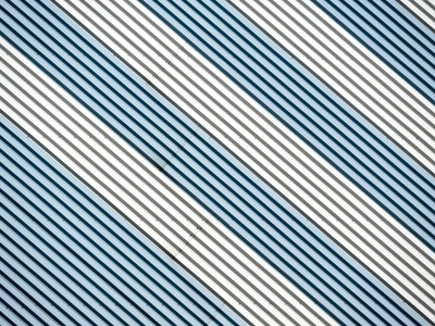 Abstract diagonal stripes in metallic tones create a dynamic modern design.